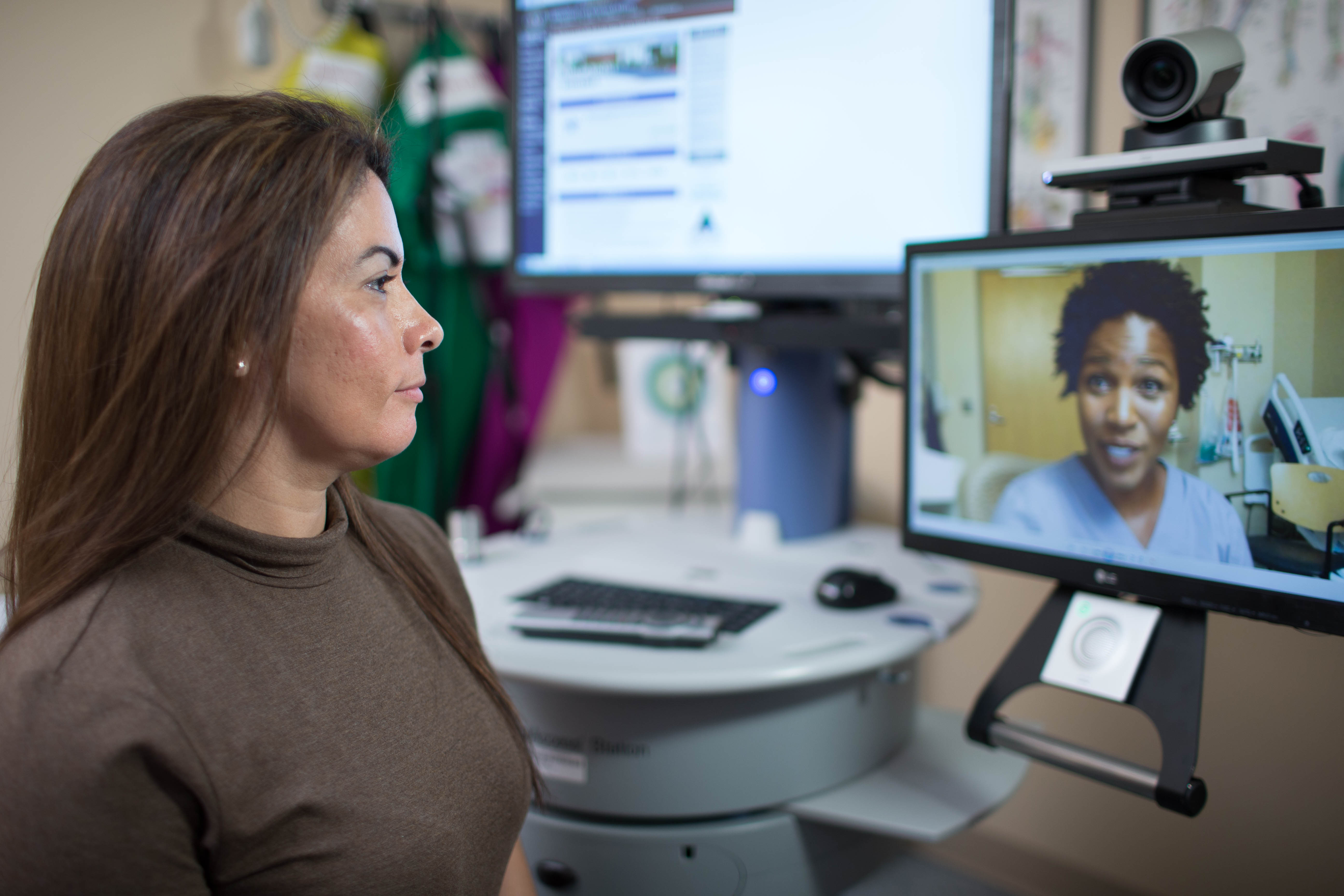 Patient using video Telehealth technology to speak with a clinician remotely.